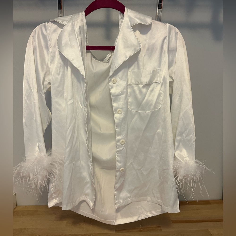 White pajama top! Bottom down. Fluffy sleeves.